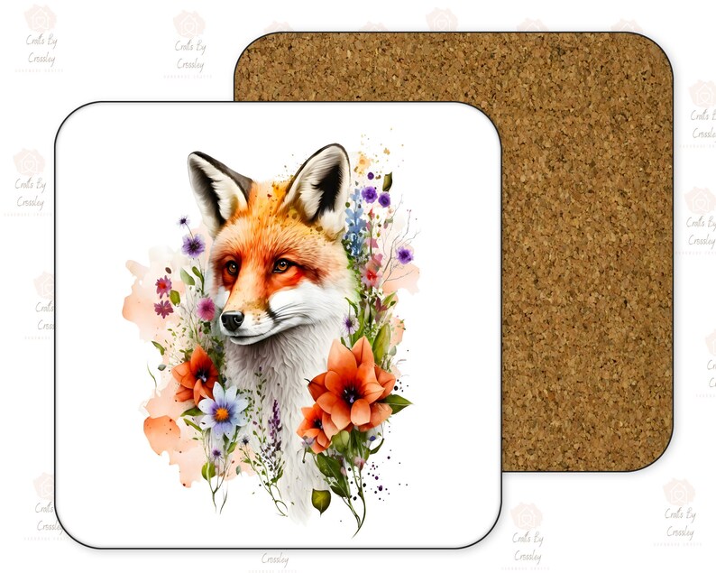May include: A white ceramic coaster with a watercolor illustration of a red fox surrounded by colorful flowers. The fox is looking to the left and has a white chest and a bushy tail.