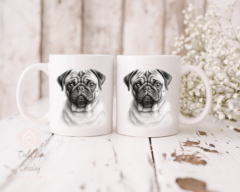 May include: Two white ceramic mugs featuring a black and white illustration of a pug dog on each mug.