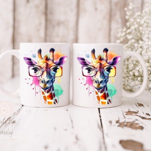 May include: Two white ceramic mugs with a colorful watercolor giraffe wearing glasses design. The giraffe has a pink, yellow, and blue watercolor background.