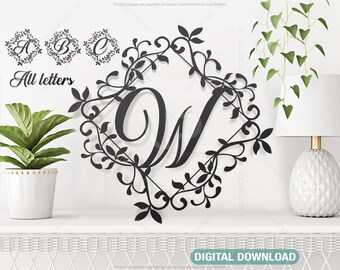 May include: A digital download of a monogram initial letter 'M' with a decorative floral wreath. The letter is black and the wreath is black with a white background.