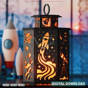 May include: A black wooden lantern with a space theme. The lantern features a rocket ship, stars, planets, and a telescope. The lantern is lit from within, creating a warm glow.