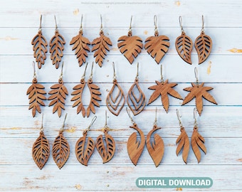 May include: A set of 18 wooden earrings featuring various leaf designs. The earrings are made of natural wood and have a light brown color. The designs include simple leaves, fern leaves, and monstera leaves. The earrings are perfect for adding a touch of nature to any outfit.
