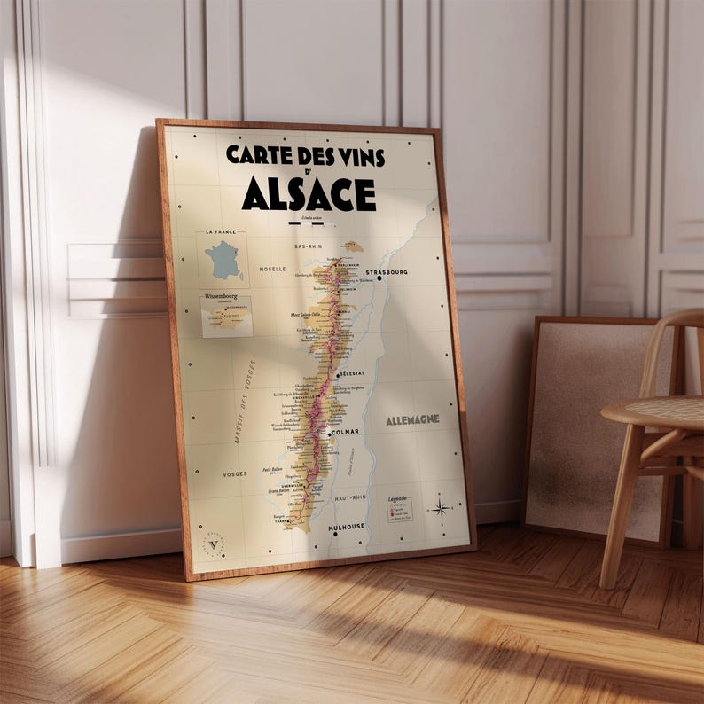 May include: A vintage-style map of the Alsace wine region in France. The map shows the different wine-producing areas, including the cities of Strasbourg, Colmar, and Mulhouse. The map is printed on a cream-colored background with brown and red accents.