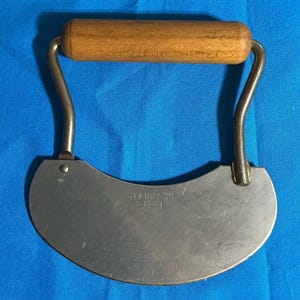 Primitive Stainless Steel Chopper with Wood Handle and Curved Blade Knife.