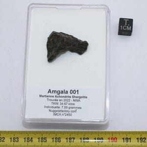 Martian Meteorite Amgala 001 in a box - Achondrite Shergottite (NWA - 7.59 grams - 027**)