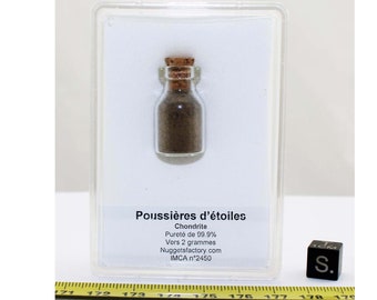 Caja que contiene Stardust en un vial, aproximadamente 2,0 gramos