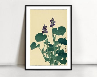 May include: A vintage Japanese woodblock print depicting a purple flowering plant with large green leaves. The print is framed in black and has a cream background.