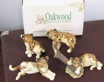 1993 Oakwood Sculptures set of 4 Leopard Lazing Hand Painted Big Cat Figurines