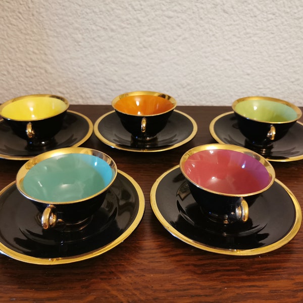 5 tasses avec soucoupes en porcelaine vintage art déco noir multicolores: noir or vert jaune orange mauve  Salins France