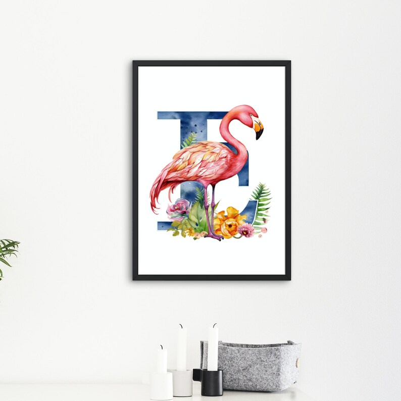 May include: A watercolor illustration of a pink flamingo standing in front of a blue letter E with tropical flowers and leaves.