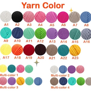 Peut inclure: Un nuancier de fils intitul&eacute; "Yarn Color". Le tableau pr&eacute;sente diverses couleurs de fils, notamment blanc, noir, rose et bleu. Chaque couleur est repr&eacute;sent&eacute;e par une petite pelote de laine et un num&eacute;ro correspondant, avec des options multicolores en bas.
