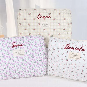 Personalized floral embroidered makeup bags for bridesmaids, bridal showers, travel organizers and Christmas gifts.