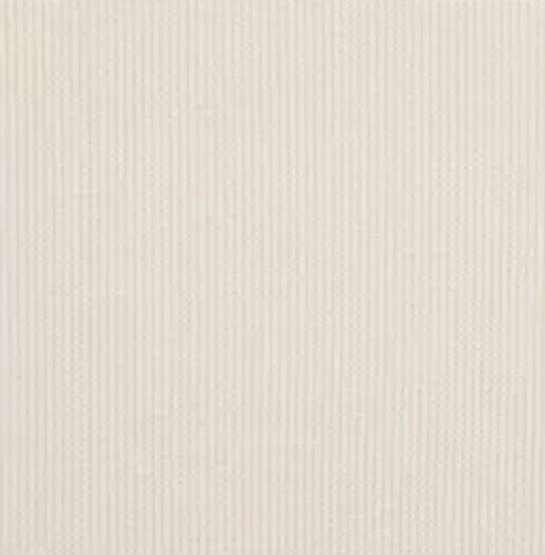 May include: A close-up of a white fabric with a subtle vertical ribbed texture.