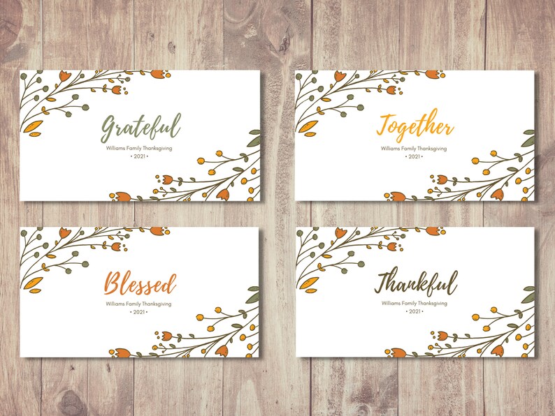 May include: Four printable Thanksgiving cards with floral designs and the words "Grateful", "Together", "Blessed", and "Thankful". Each card includes the text "Williams Family Thanksgiving - 2021 - "