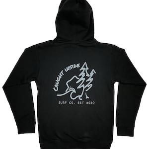 May include: Black hooded sweatshirt with a white graphic of a tree and the text "Caught Inside Surf Co. Est 2020".
