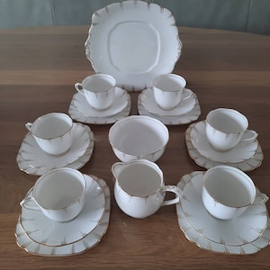 Royal Albert Crown China Tea and Cake Set for Six, white and gold.