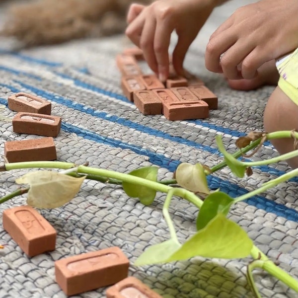 Hand made, plastic free childrens building blocks. Made from terracotta, eco friendly, imaginative and mindful play, slow architecture