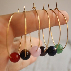 Minimalist hoops earrings with round natural stones. Golden earrings with semiprecious stones to choice. Hypoallergenic earrings. SUAYART.