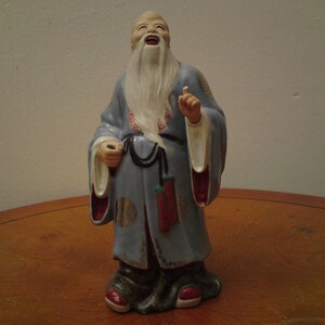 Shoulao God of longevity Immortal sage figure in the style of Zeng Longsheng
