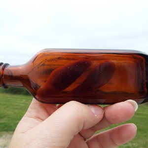 Brown Vintage Medicine Bottle