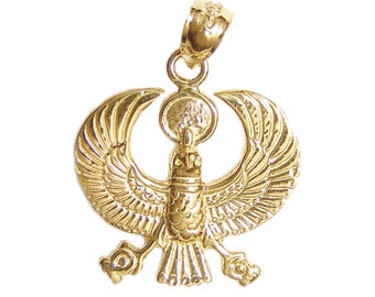May include: A gold pendant featuring the Egyptian goddess Isis with outstretched wings. The pendant is detailed with intricate carvings and a sun disc above her head.