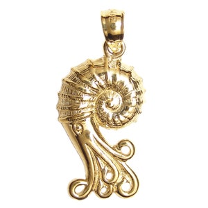 May include: A gold-colored pendant in the shape of an ammonite with a detailed spiral shell and tentacles.