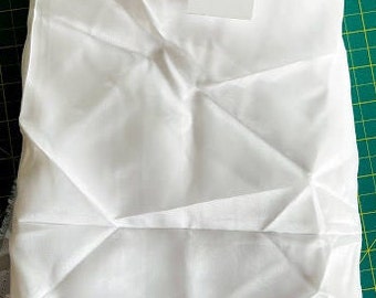 Forro de poliéster blanco, ligero.