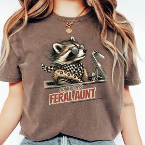 Comfort Colors Pregnancy Reveal to Sister Auntie Shirt, Somebody&#39;s Feral Aunt Shirt, Racoon Shirt, Feral Aunt Shirt, Pregnancy Reveal Gift