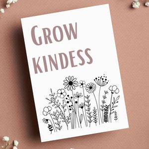 Puede incluir: Una tarjeta blanca con texto negro que dice "GROW KINDNESS" y un dibujo de l&iacute;nea negra de un campo de flores.