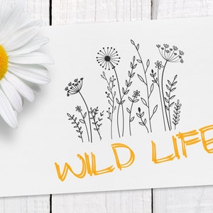 May include: A white card with a black and white illustration of wildflowers and the text "WILD LIFE" in yellow.