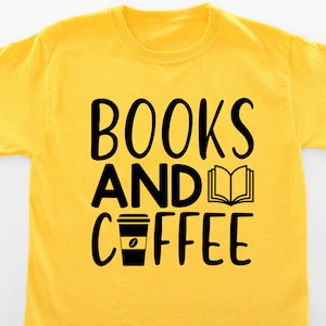 May include: Yellow t-shirt with black text that reads "BOOKS AND COFFEE" with a book and coffee cup graphic.