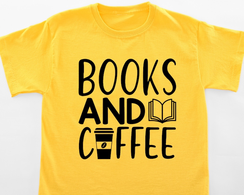 May include: Yellow t-shirt with black text that reads "BOOKS AND COFFEE" with a book and coffee cup graphic.
