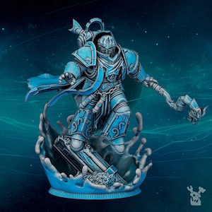 May include: A detailed, blue-toned figurine of a futuristic warrior in ornate armor, standing on a wave-like base. The figure is holding a staff and has intricate designs on the armor. The overall theme is science fiction or fantasy.