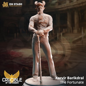 May include: A 3D printed miniature of a devilish figure with horns, a goatee, and a pipe. The figure is wearing a detailed suit with ornate buttons and a cane. The figure is standing on a base with the text "Xarvvir Barikdral The Fortunate" and the logo "CRUCIBLE OF THE CHOSEN".