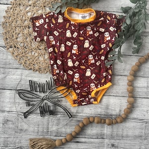 Baby wizard sweater romper