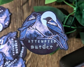 Sticker or Magnet - "Attempted Murder" - Crows - Funny Puns - Halloween - Dark Humor - Spooky - Flock of Birds - Novelty Gift