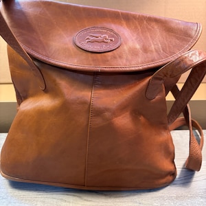 american angel leather backpack Kiss Women's Backpacks & Shoulder Bags It is made of faux leather and features a top zipper closure and front zippered pocket Loungefly LA Angels Patches Mini