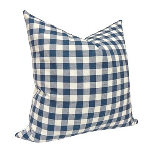 May include: A square pillow with a blue and white checkered pattern. The pillow has a classic gingham design, with a soft, textured appearance. The pillow is a decorative item for a bed or sofa.