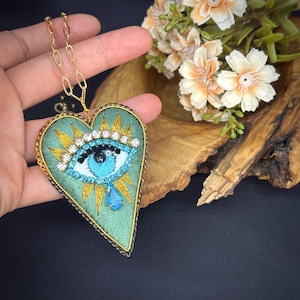 Support pour rétroviseur de voiture Heart Evil Eye : ornement de voiture en cristal