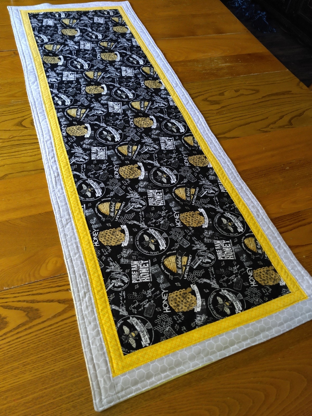 Garden Hive Quilted Table Runner NCU0NTD575