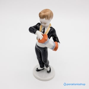 Boy Playing the Accordion, rare vintage Hollohaza porcelain figurine