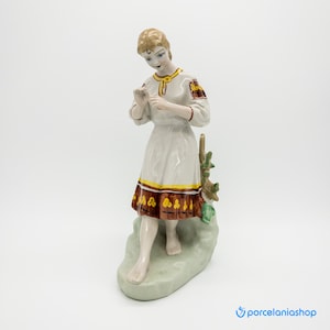 Girl with Flower, very rare vintage Polonne porcelain figurine
