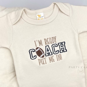 Embroidered Football I’m Ready Coach Put Me In Bodysuit • Football Pregnancy Announcement • Football Games • Newest Football Fan Bodysuit