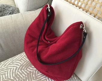 Burgundy velvet “hobo” handbag with leather handle