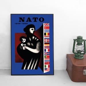 May include: A framed poster featuring the text NATO 1949-1959 in black. The graphic depicts a stylized black and white figure holding a child against a blue and red background. A vertical column of national flags is displayed on the right side.