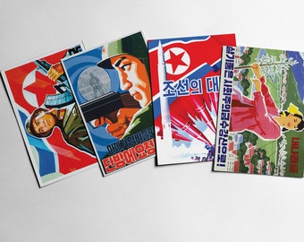 May include: Four vintage North Korean propaganda postcards. The postcards feature images of soldiers, missiles, and a woman working in a field. The text on the postcards reads "미제가덤벼들만 단빙에요정", "조선의 대", "살기좋은 사회주의금수강산으로!" and "내나라를".