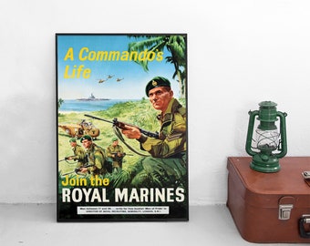 May include: A framed vintage recruitment poster titled A Commando's Life Join the ROYAL MARINES, featuring illustrations of soldiers in green uniforms with rifles, helicopters, and a ship at sea, with text at the bottom regarding recruitment.