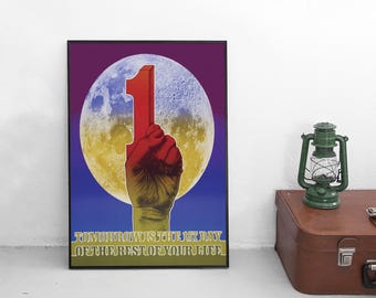 May include: A framed poster with a retro design. The artwork features a red hand holding up a red number one against a backdrop of a full moon. The text at the bottom reads "Tomorrow is the 1st day of the rest of your life."