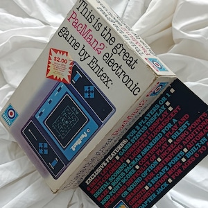 ENTEX, &quot;Pac Man 2&quot;, &quot;Hungry Pac&quot;, 80s handheld game, portable arcade game, handheld classic, collectors item, multiplayer game, Bally Midway