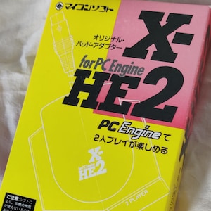 NOS NEC PC Engine, &quot;X-He 2 Pad Adapter&quot;, complete in box & original, working game pad adapter, new gaming accessory, 80s video gaming system